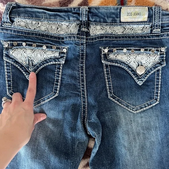 ZCO bootcut distressed jeans with design on back pockets. - Picture 4 of 4